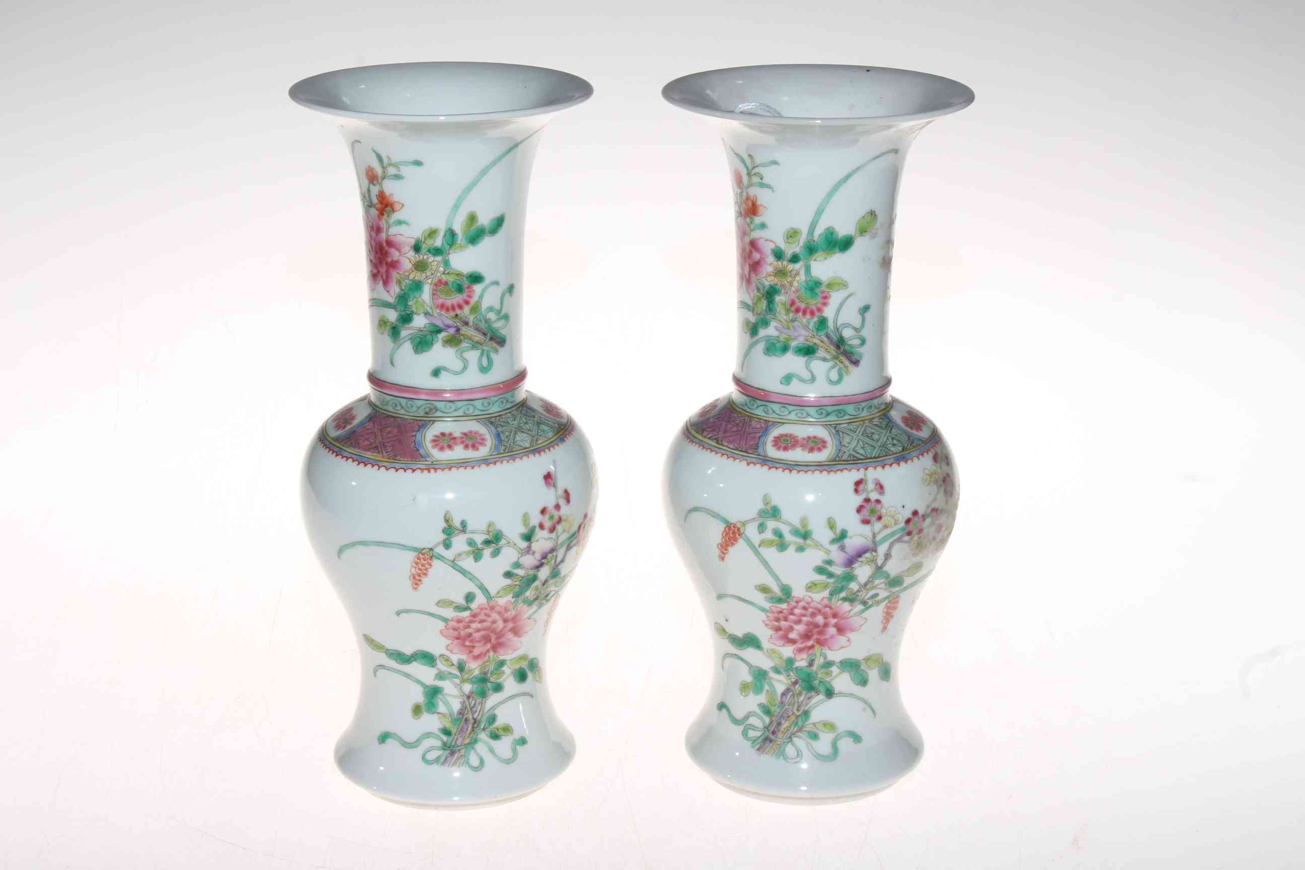 Pair Chinese famille rose vases, with floral decoration.