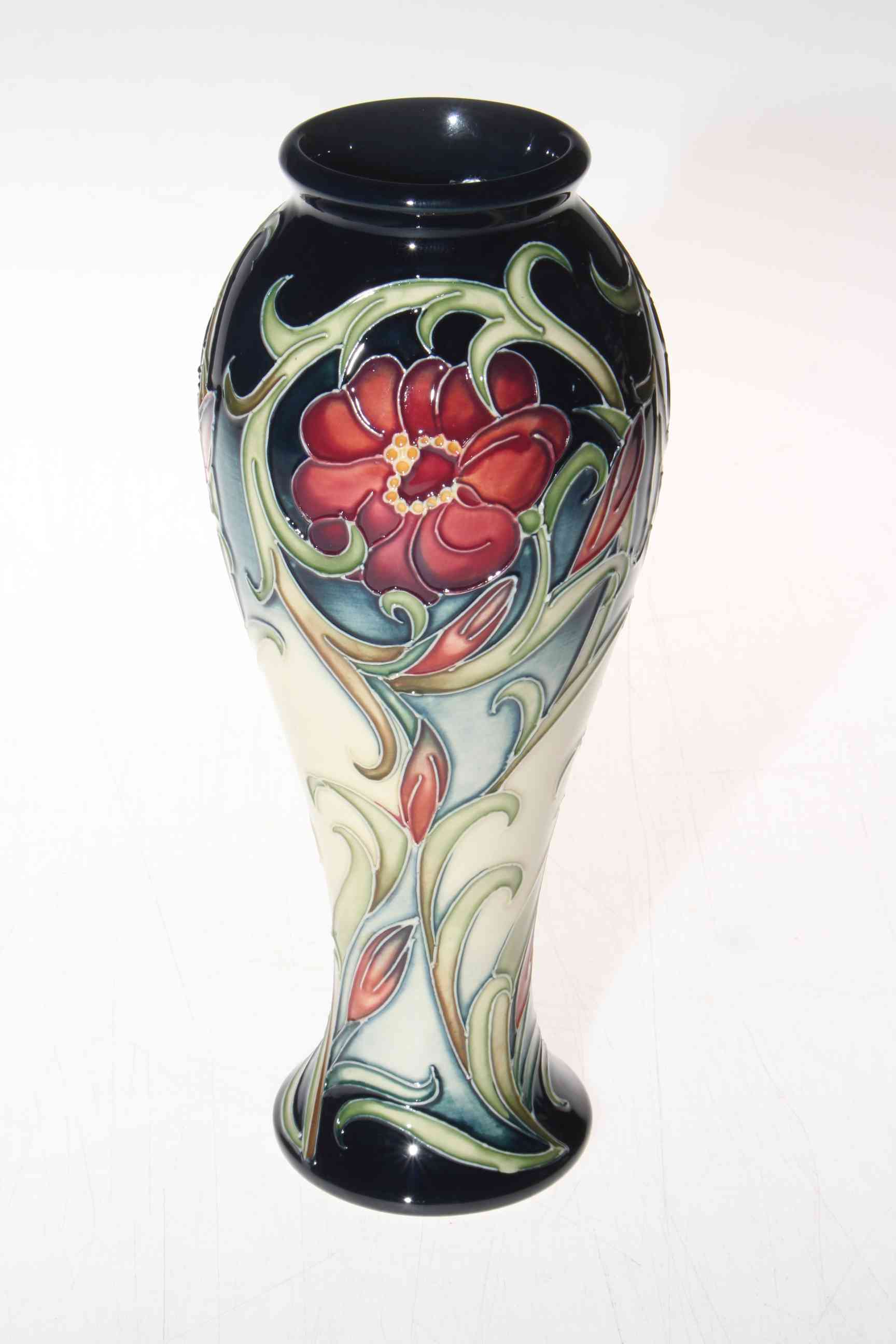 Moorcroft stylised anemone vase by Kerry Goodwin, 21cm, with box.