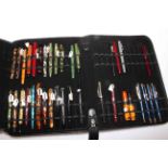 Collection of fountain pens and other pens in case including Sheaffer, Conway, Monteverde, Misak,