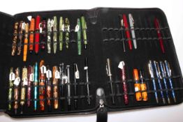 Collection of fountain pens and other pens in case including Sheaffer, Conway, Monteverde, Misak,