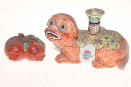 Chinese Dog of Foo spill vase, 19cm long, and pomegranate ornament (2).