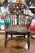 Windsor pierced splat back elbow chair with crinoline stretcher.