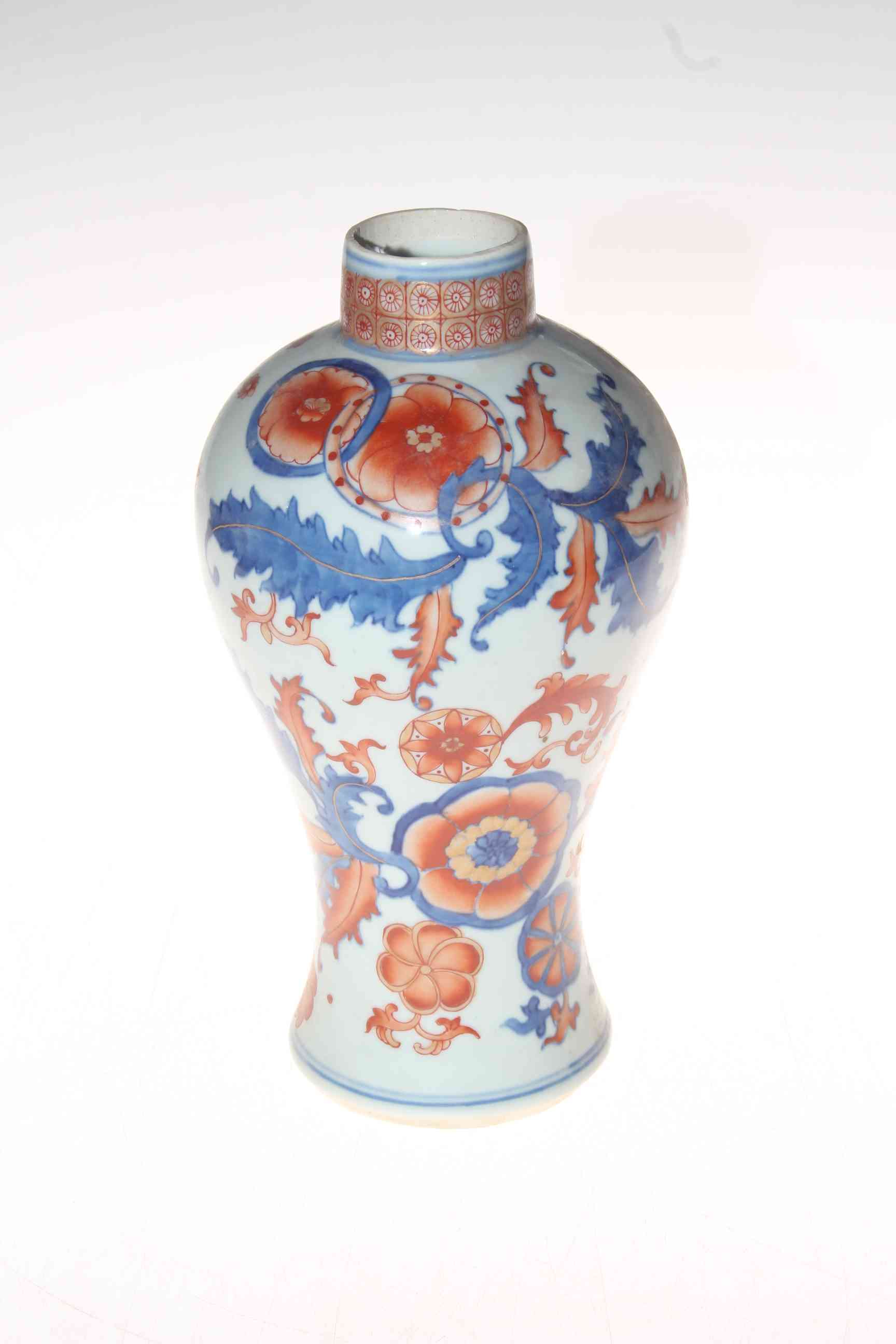Chinese Blue Royal baluster vase, with scrolling foliage decoration, 25cm.