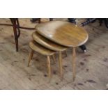 Vintage Ercol pebble nest of three tables (largest 40cm high by 65cm wide by 44cm deep).
