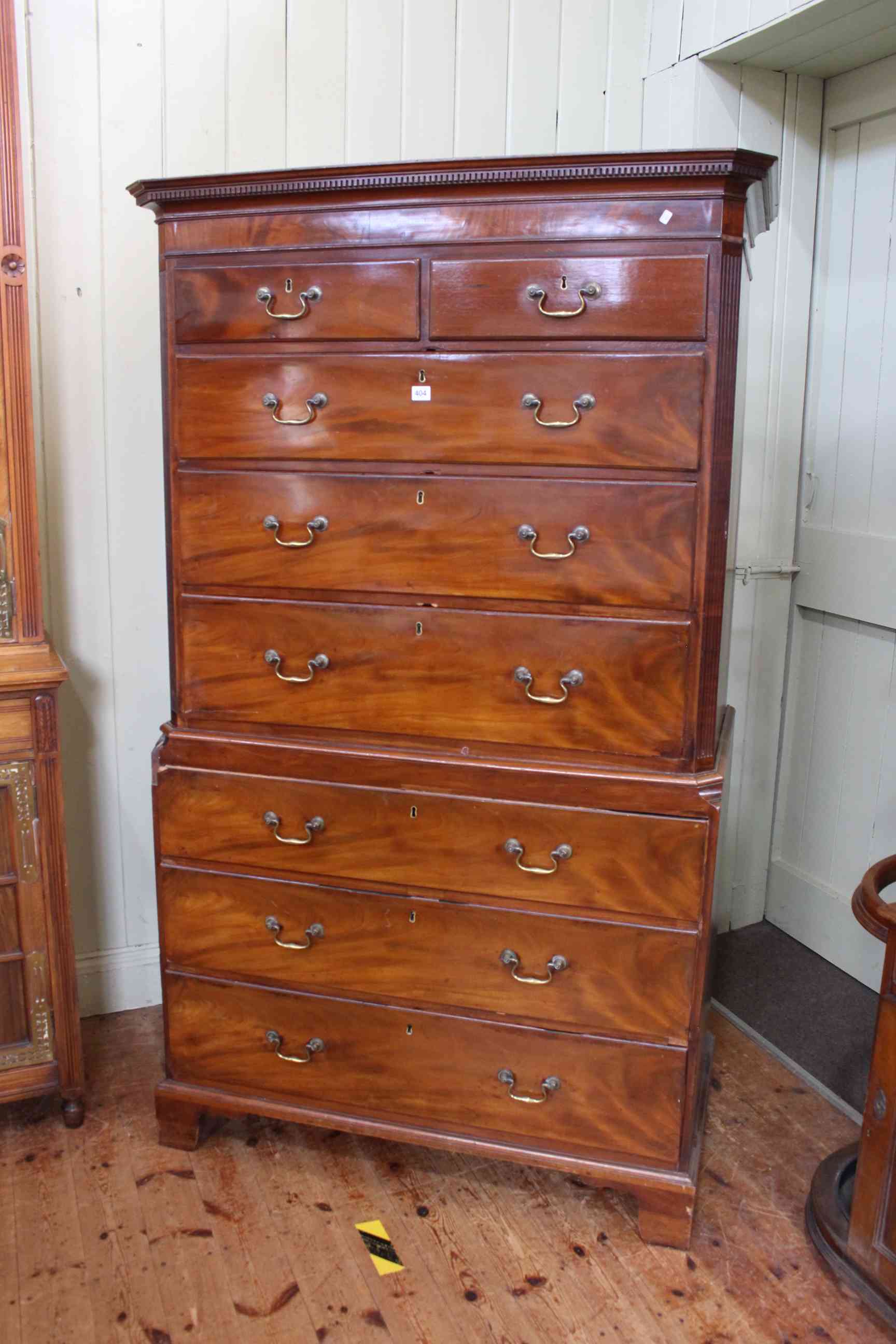 Georgian mahogany eight drawer chest on chest having reeded canted corners and on bracket feet,