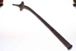 Fijian Totokia club, the head carved with nodules and tapering to a point,