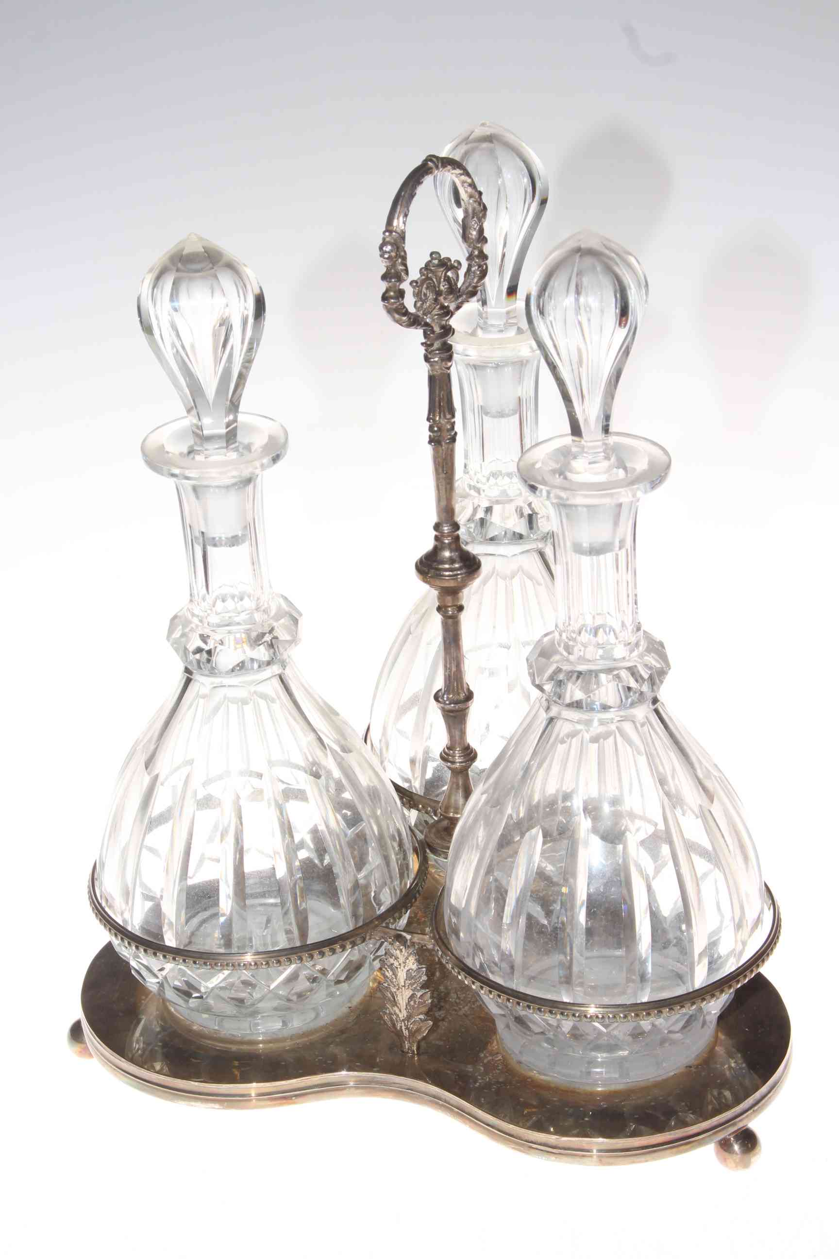 Silver plated decanter stand with three glass decanter bottles, 40cm high. - Image 2 of 2