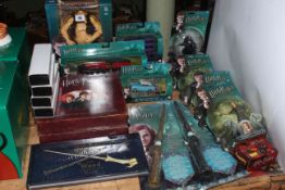 Harry Potter collectables, boxed figures, wands, Hogwarts Express, plates, etc,