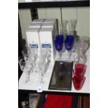 Six Caithness wine glasses with boxes and other glassware and framed silver oval plaques.