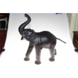 Leather elephant, 69cm by 56cm.
