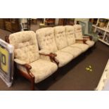 Parker Knoll three piece lounge suite in light buttoned floral fabric.