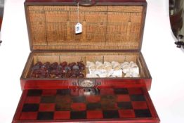 Oriental cased chess set.