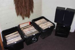 Three boxes of vinyl records and a Sony Stereo system.