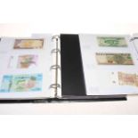 Two albums of Worldwide A to Z banknotes including uncirculated, high revenues, Middle East,