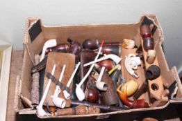 Collection of various pipes including 19th Century clay pipes and Meerschaum.