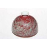 Chinese brush washer with mottled ox blood glaze, 13cm across.