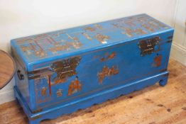 Blue lacquered and chinoiserie painted trunk,