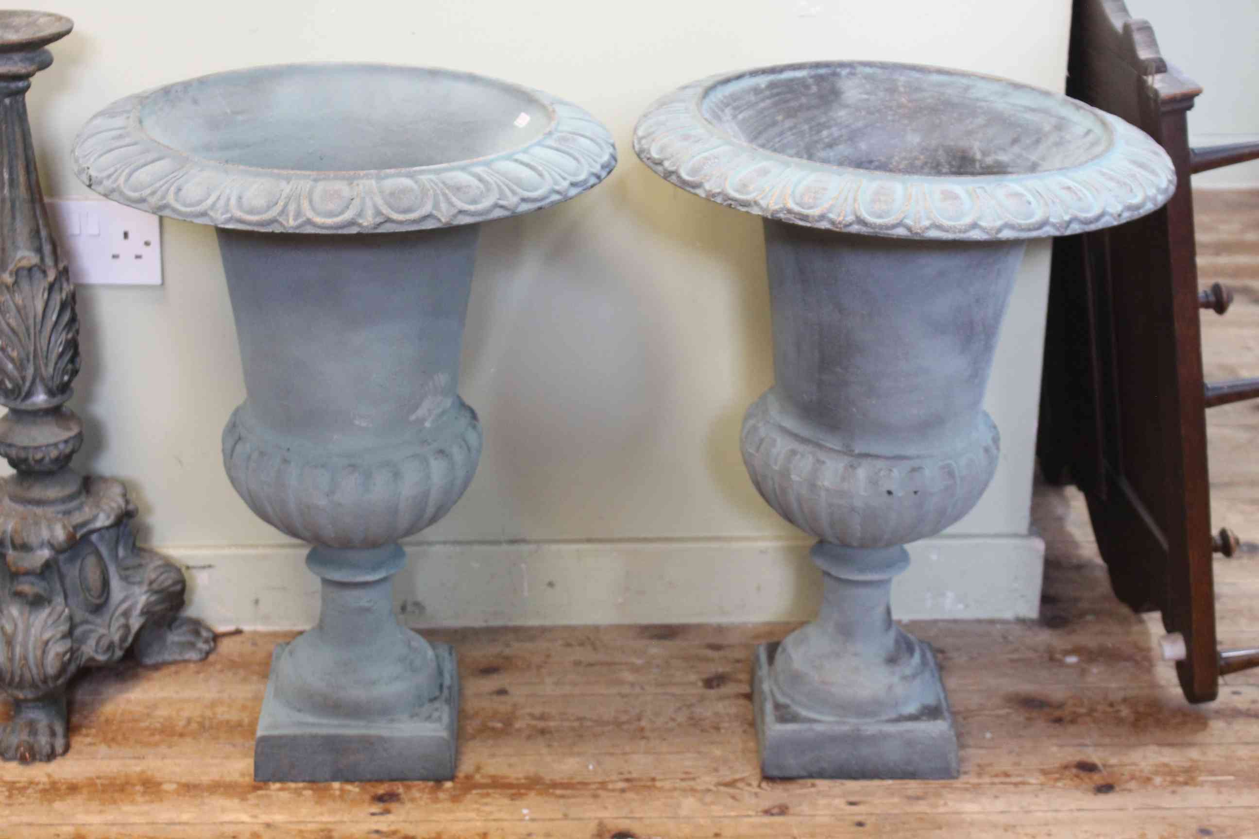 Pair Campana style cast pedestal garden urns, 63cm high by 48cm diameter.