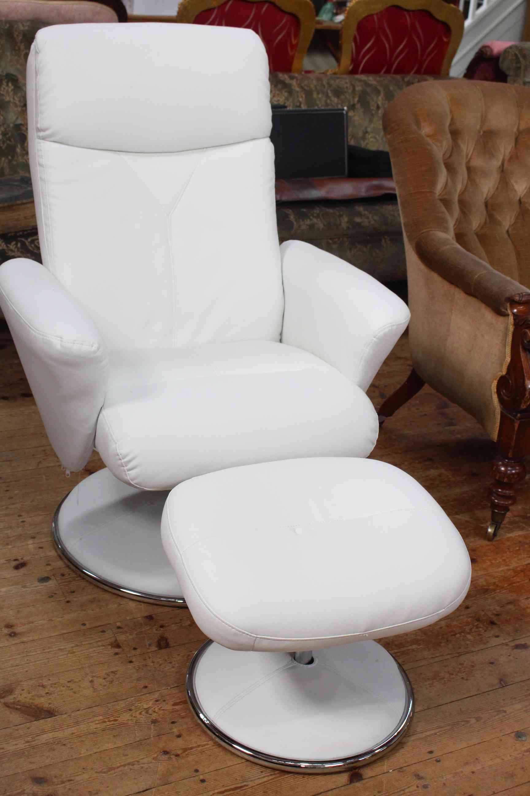 Contemporary swivel reclining chair and footstool.