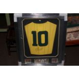 Framed Brazil football shirt with signature for 'Pele'.