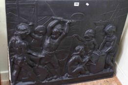Cast iron plaque depicting children at work in a forge, impressed A. Carrier, 69cm by 85cm.