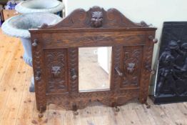 Victorian carved oak ten hook hall mirror, 80cm by 90cm.