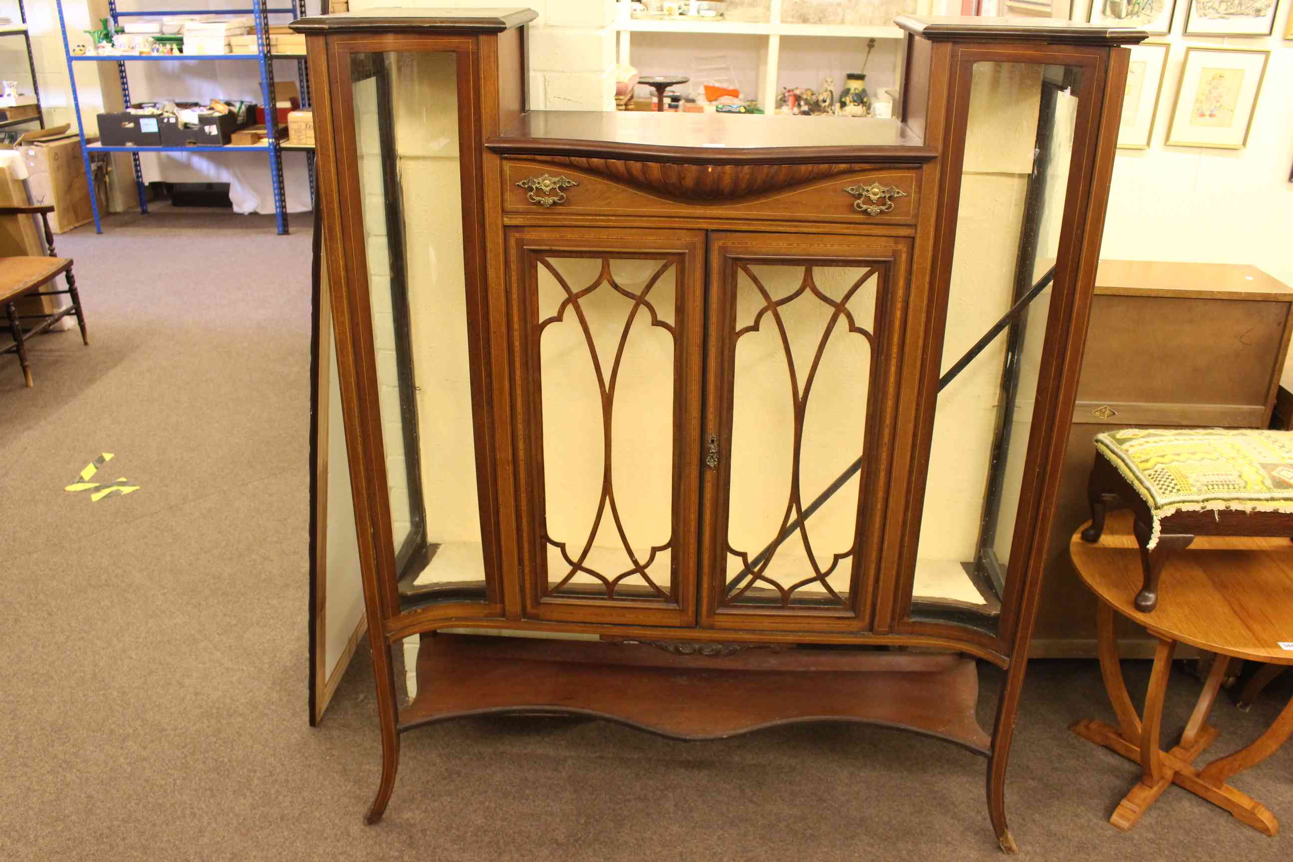 Edwardian mahogany and line inlaid shaped front parlour cabinet,