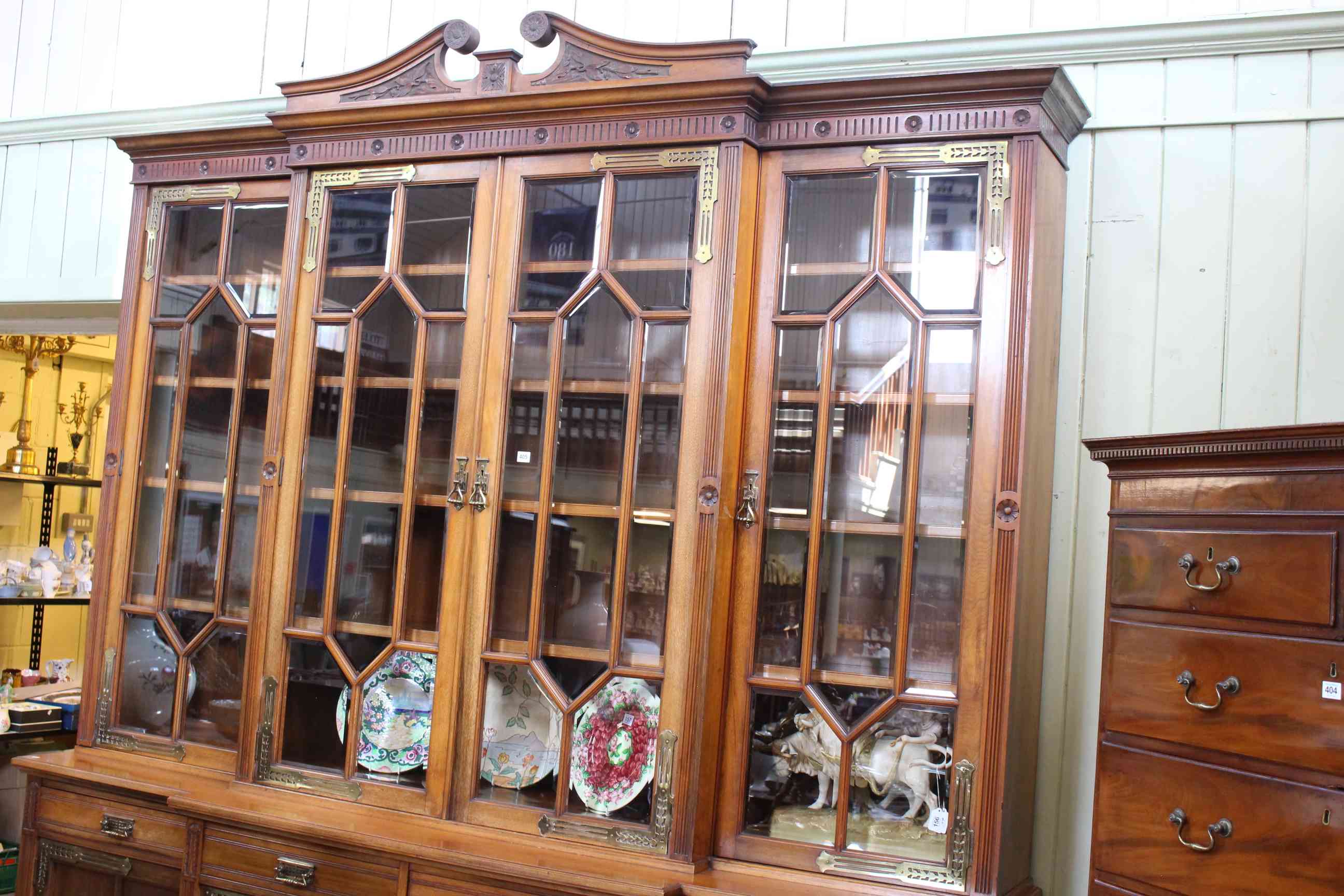 Impressive Victorian aesthetic breakfront library bookcase having swan neck pediment above four - Image 3 of 3