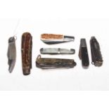 Collection of seven vintage pocket knives.