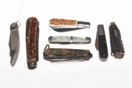 Collection of seven vintage pocket knives.