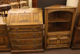 Old Charm four drawer bureau and two door corner cabinet (2).