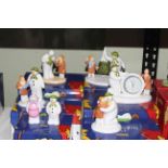 Coalport Characters The Snowman groups, and figures and annual plaque, seven pieces with boxes.