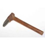 Fijian stone adze, hafted stone adze with coconut fibre binding, chip carving to base of handle,