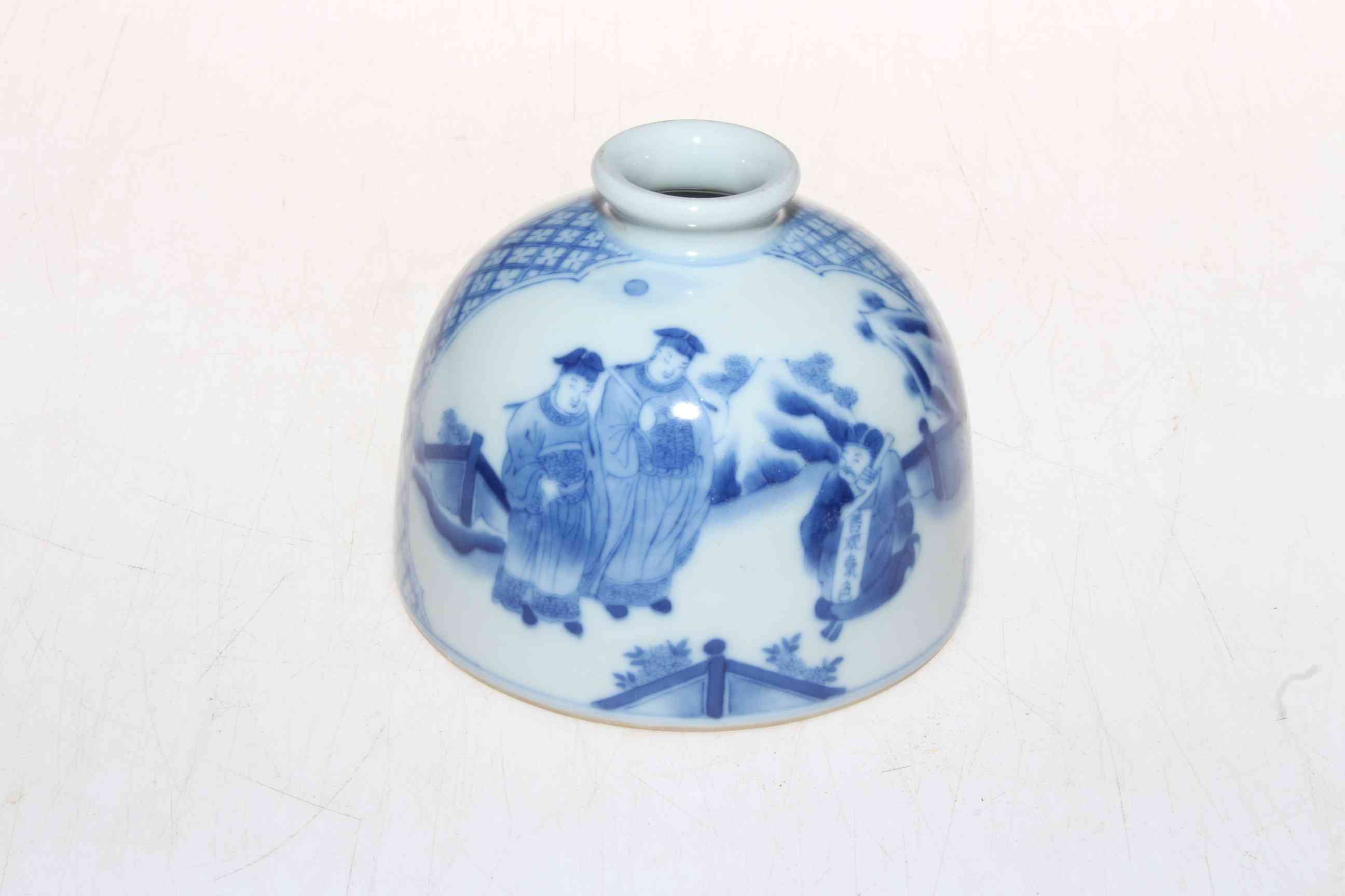 Chinese blue and white brush washer with two panels of figures, 8cm high.