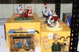 Coalport characters Wallace & Gromit groups, five pieces with boxes,