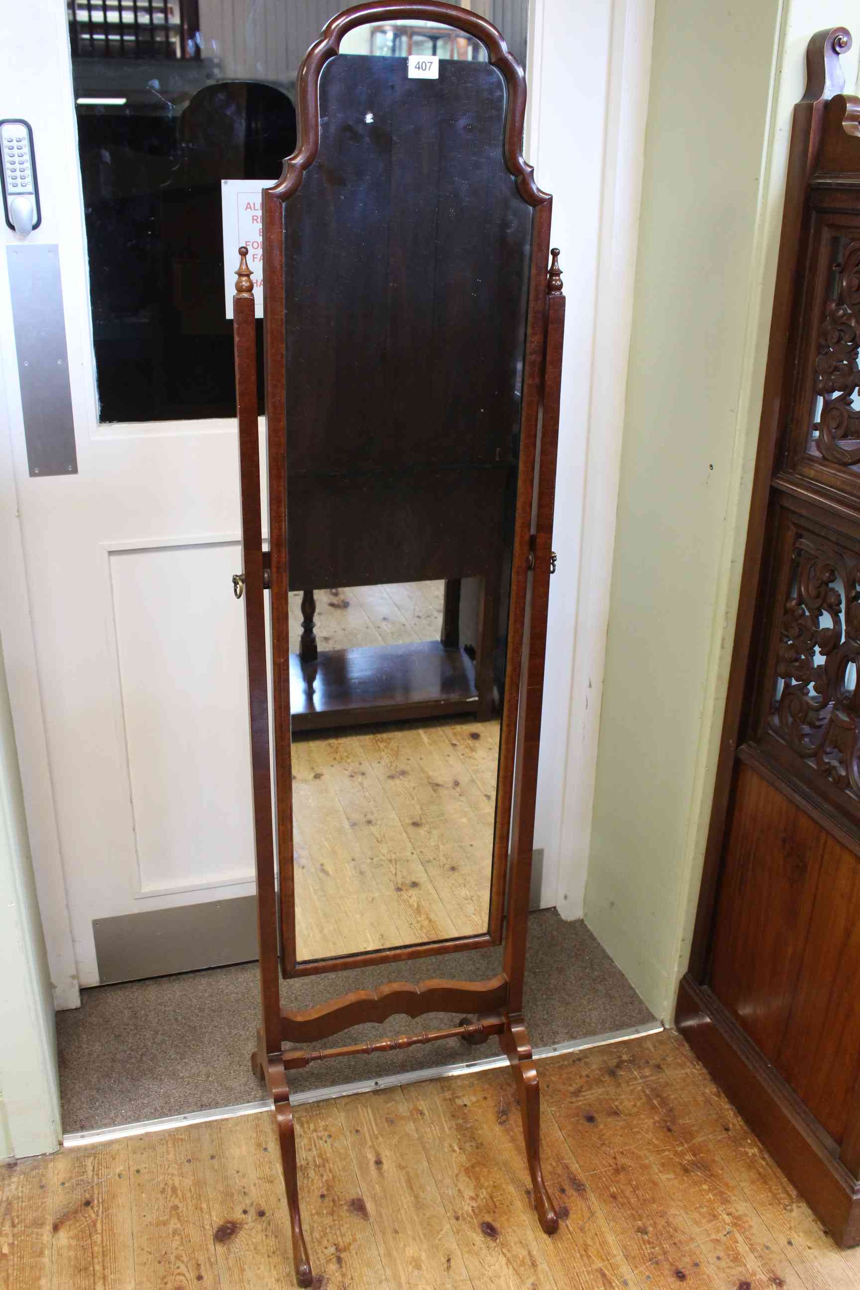 Mahogany arched top cheval mirror, 162cm high by 42cm wide.