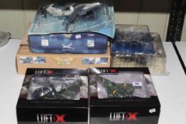 Collection of boxed model aircraft.