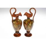 Pair Linthorpe Pottery ewers, shape no. 1936, 29cm.