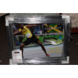Framed running shoe signed by Usain Bolt with Certificate of Authenticity.