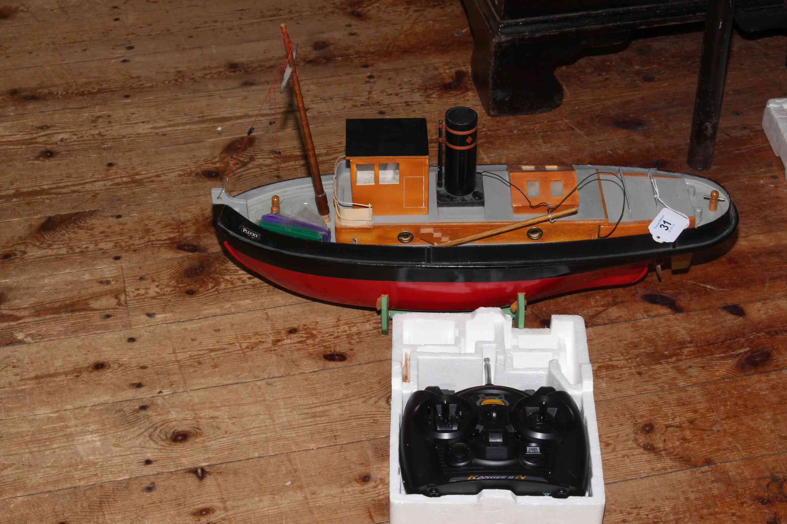 Remote Control model boat 'Plucky' with Range II control.