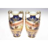 Pair Noritake desert scene two handle vases, 24.5cm.