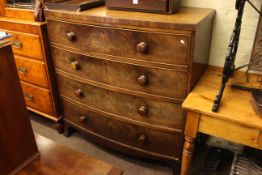 Victorian mahogany bow front chest of four long drawers on splayed legs,