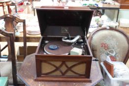 HMV table top gramophone and collection of records.