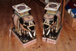 Pair of decorative pottery elephant seats.