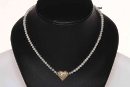 Seed pearl necklace with 18 carat gold and diamond heart shape and clasp.