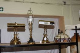 Pair of brass desk lamps, brass table lamp and Tiffany style shade.