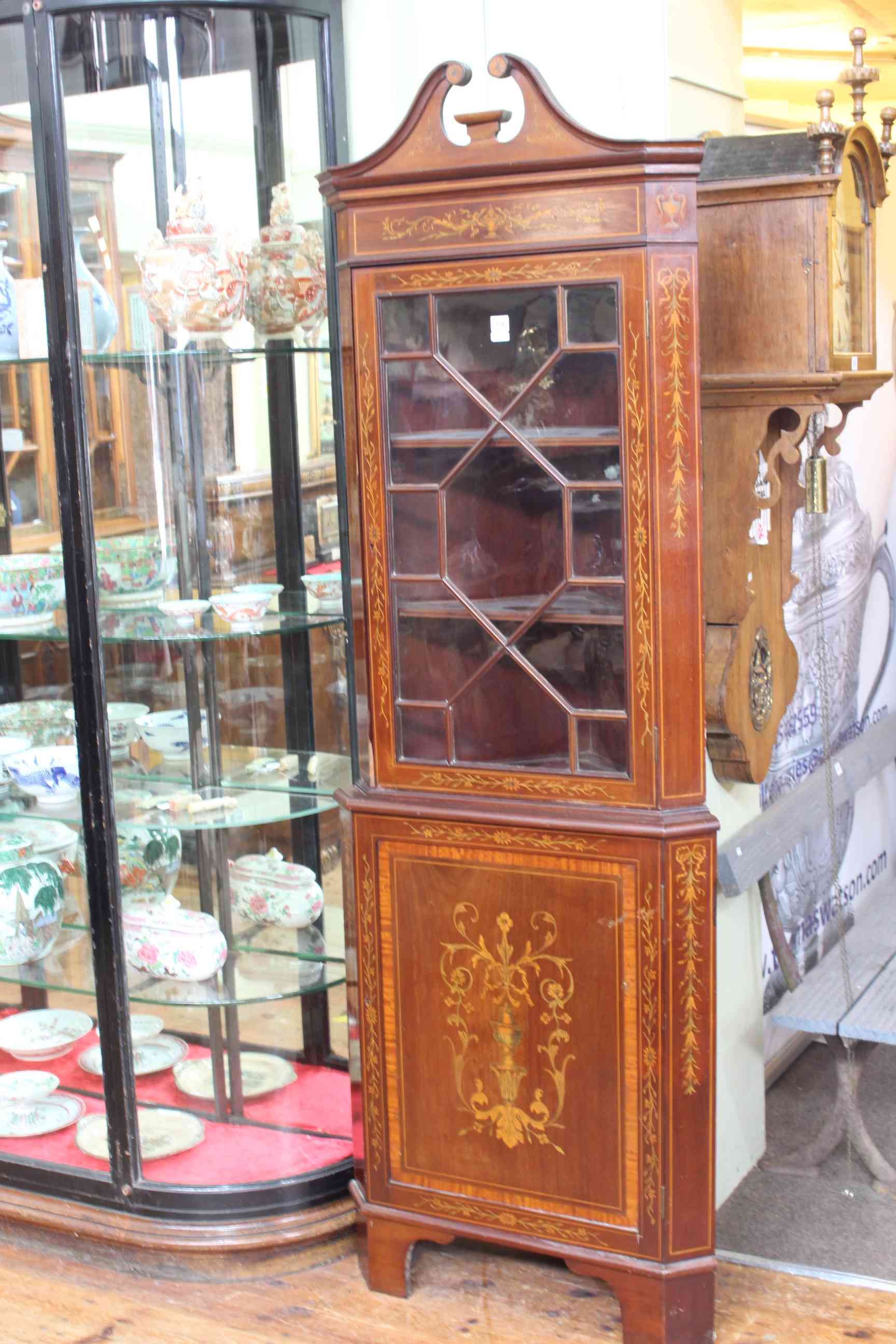 Victoria inlaid mahogany astragal glazed door top standing corner cabinet, 210cm high.