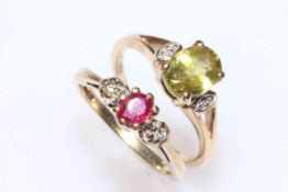 Two 9 carat gold rings, ruby and diamond, and peridot.