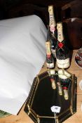 Three bottles Moet & Chandon champagne (star studded) and mirrored drinks tray (4).