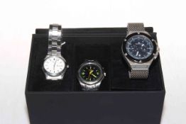 Three gents wristwatches, Navigator with box and charger, Constantine and Seiko.